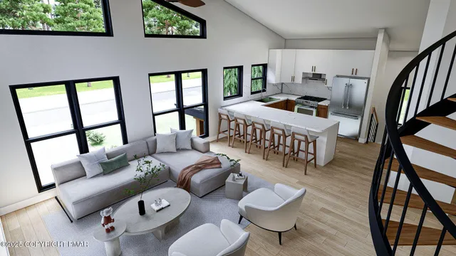 a bedroom with furniture and a wooden floor