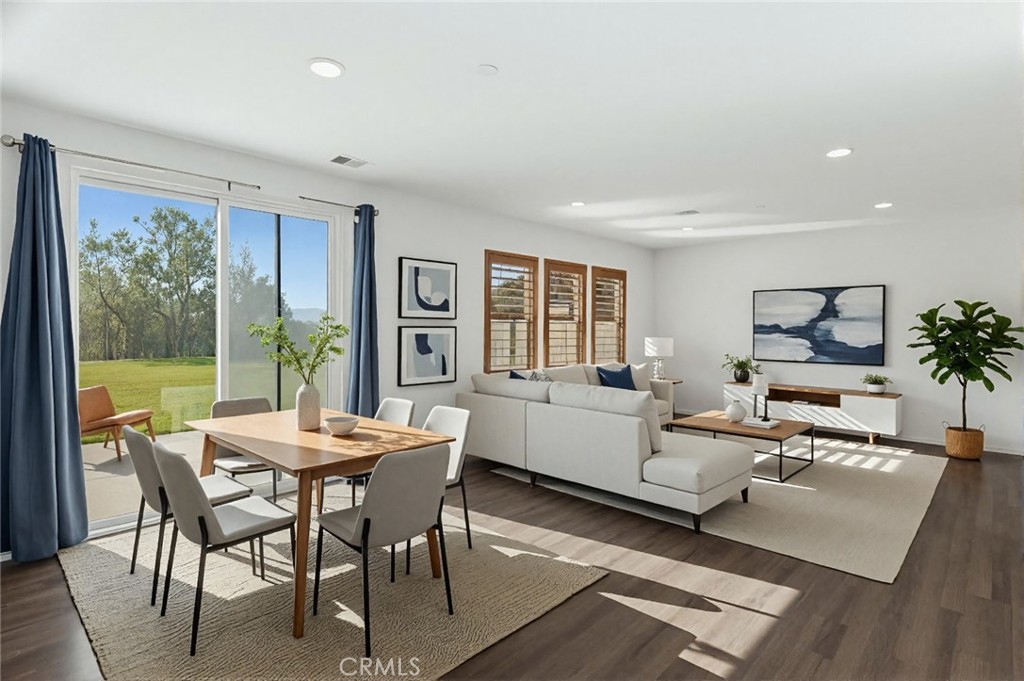 20765 Barn Road Riverside, CA 92507 - Photo 11 of 56 a living room with furniture and large windows