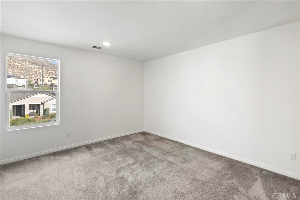 20765 Barn Road Riverside, CA 92507 - Photo 36 of 56 an empty room with a window