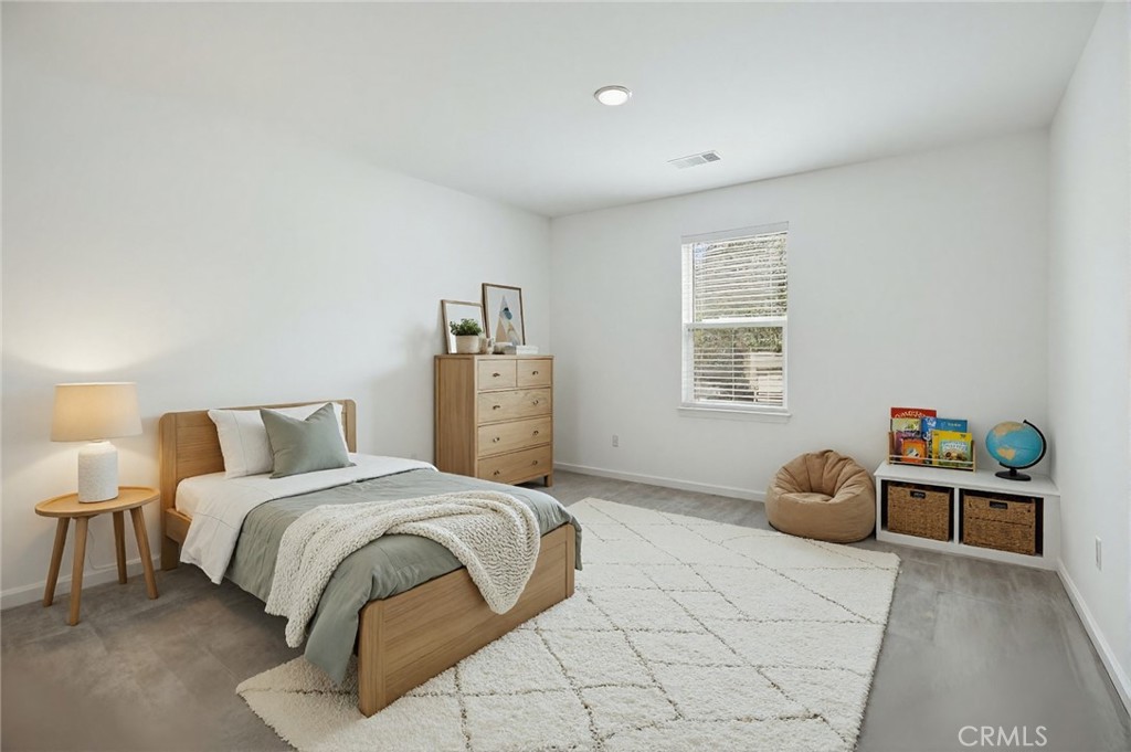 20765 Barn Road Riverside, CA 92507 - Photo 38 of 56 a bedroom with a bed and a window