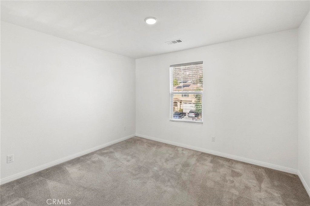 20765 Barn Road Riverside, CA 92507 - Photo 39 of 56 an empty room with a window