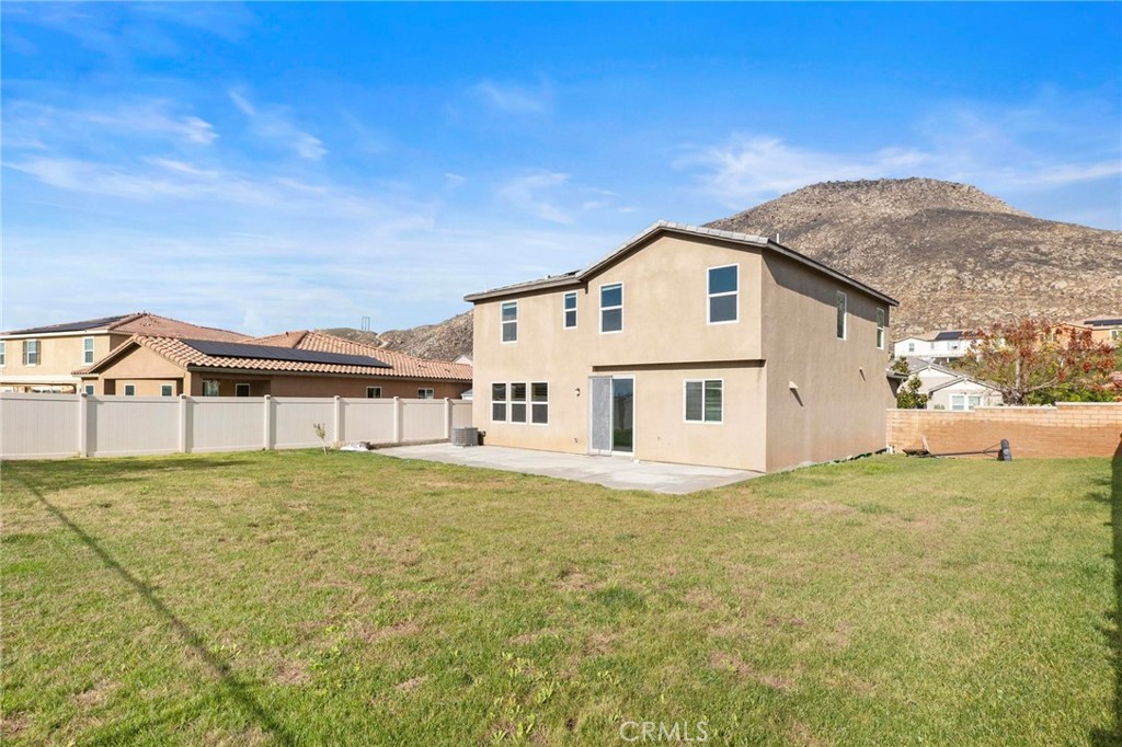 20765 Barn Road Riverside, CA 92507 - Photo 50 of 56 a view of a house with a yard