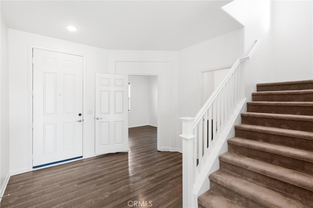 20765 Barn Road Riverside, CA 92507 - Photo 6 of 56 a view of entryway with wooden floor