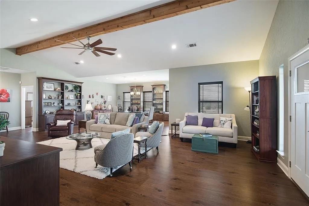 125 Heritage Road Gordonville, TX 76245 - Photo 22 of 40 a living room with furniture wooden floor and a large window