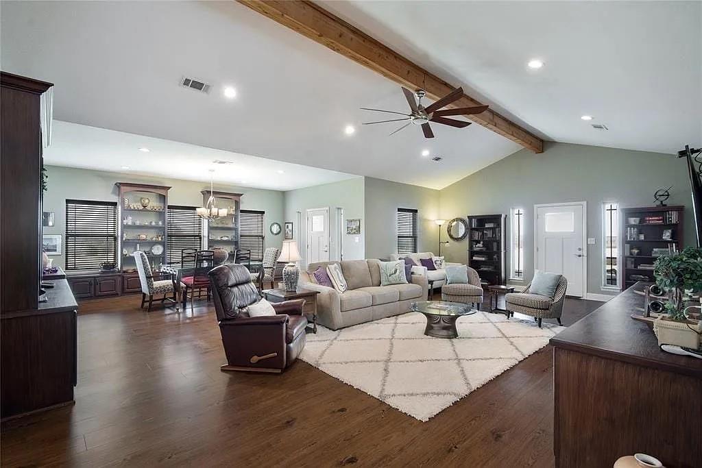 125 Heritage Road Gordonville, TX 76245 - Photo 23 of 40 a living room with fireplace furniture and wooden floor