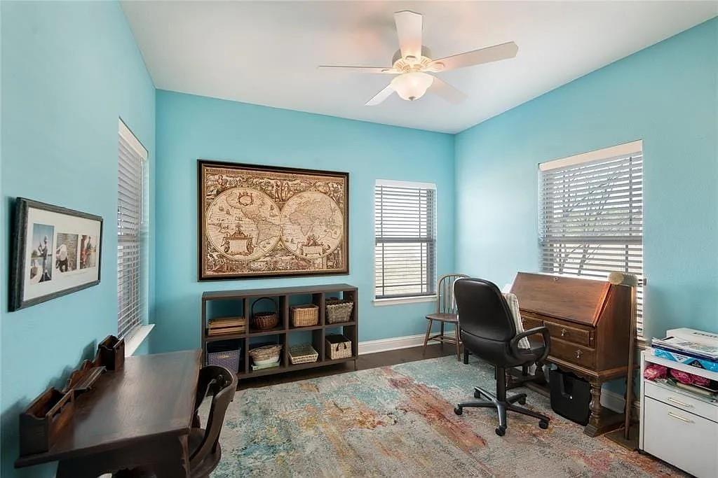 125 Heritage Road Gordonville, TX 76245 - Photo 34 of 40 a view of a workspace with furniture and a window
