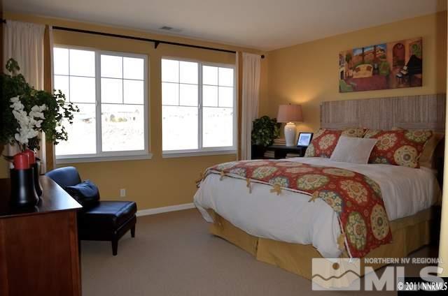9035 Sydmesa Drive Reno, NV 89523 - Photo 6 of 8 a bedroom with a bed and window