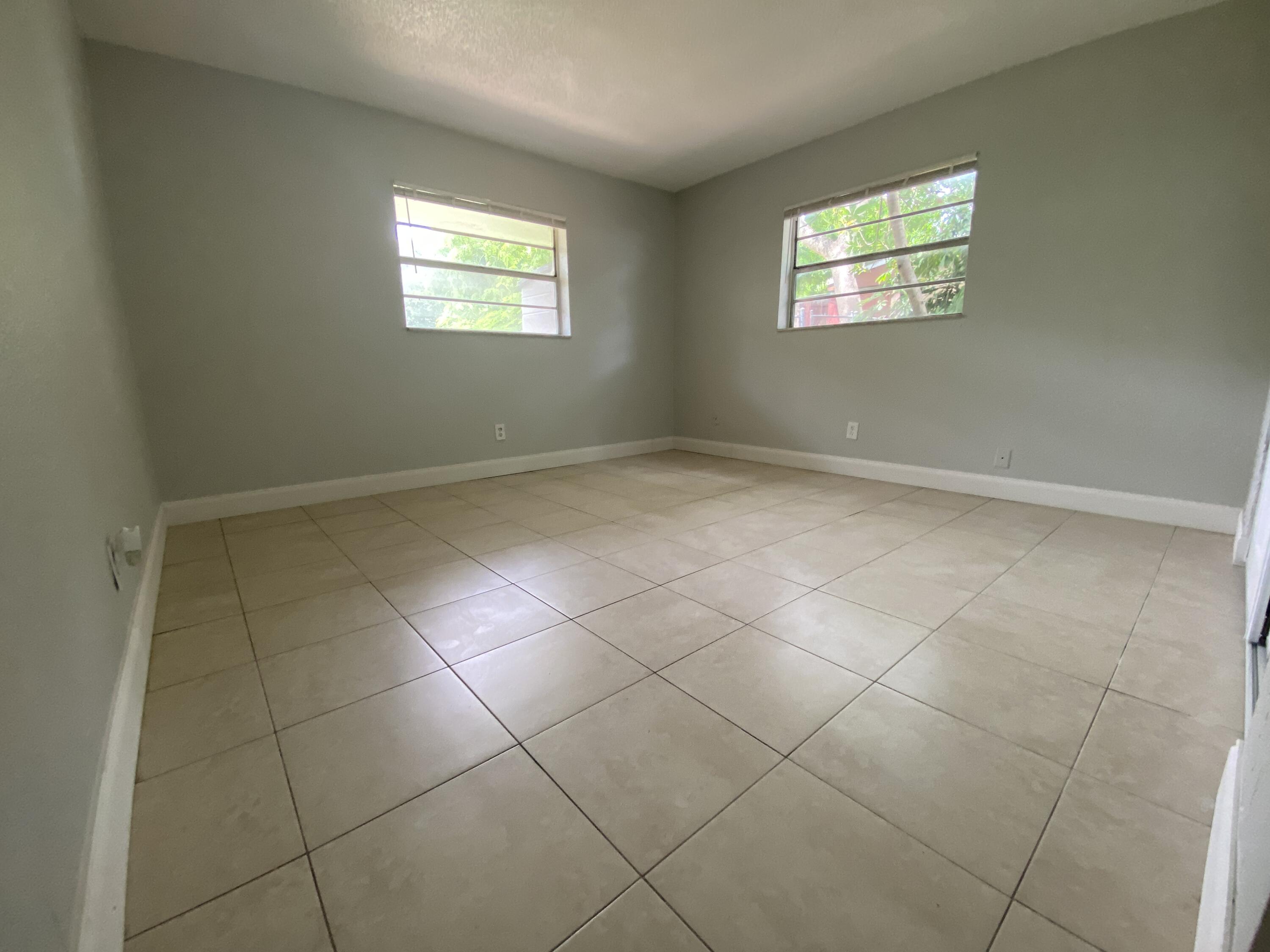 4327 Cocoanut Road West Palm Beach, FL 33406 - Photo 18 of 24 a view of empty room with windows