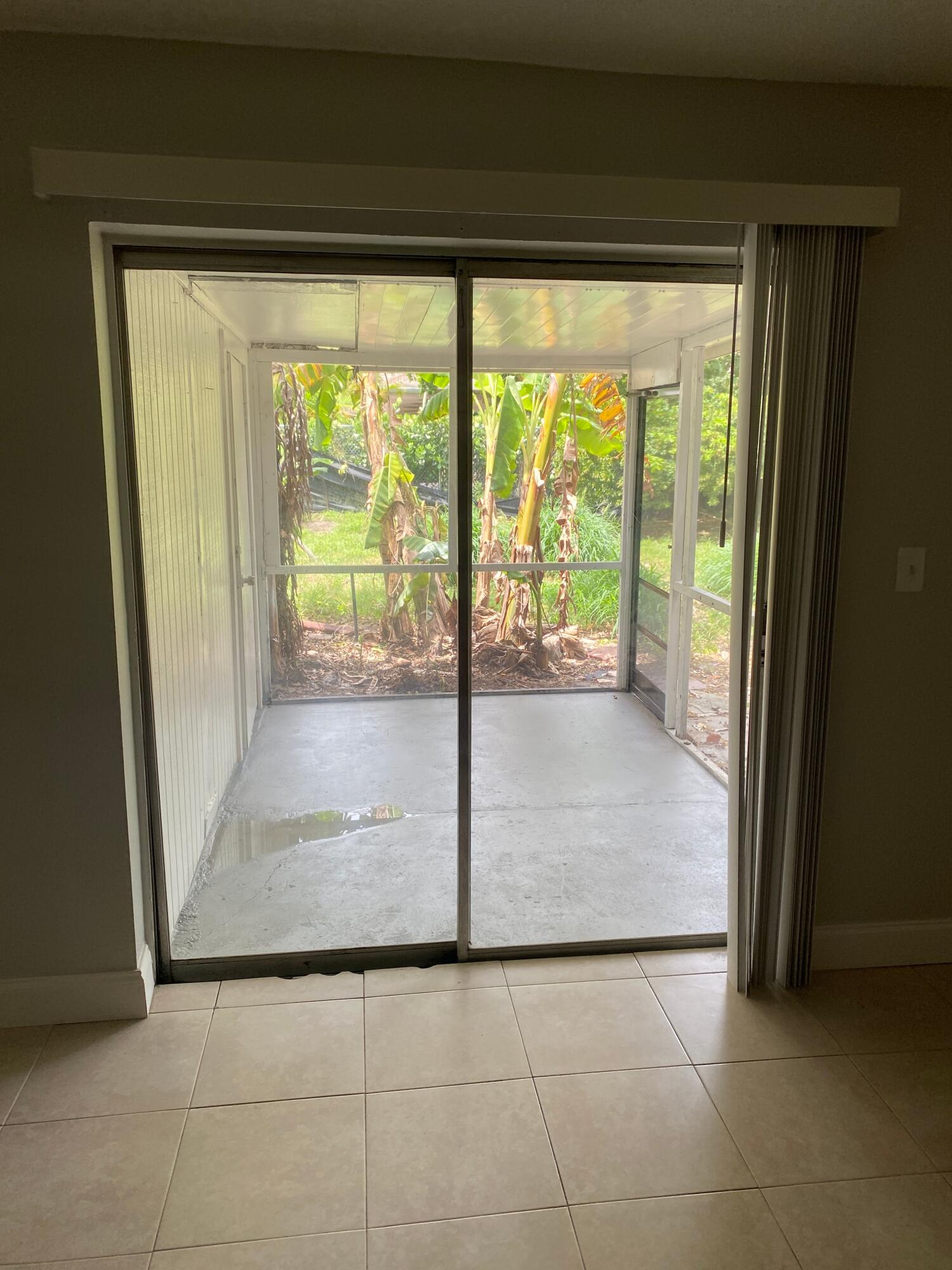 4327 Cocoanut Road West Palm Beach, FL 33406 - Photo 7 of 24 a view of an empty room and window