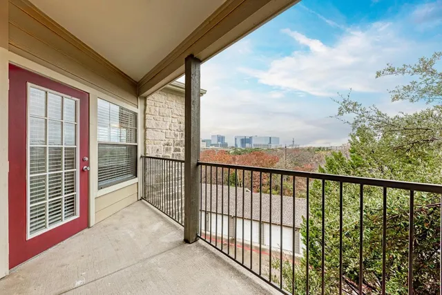 a view of a city from a balcony