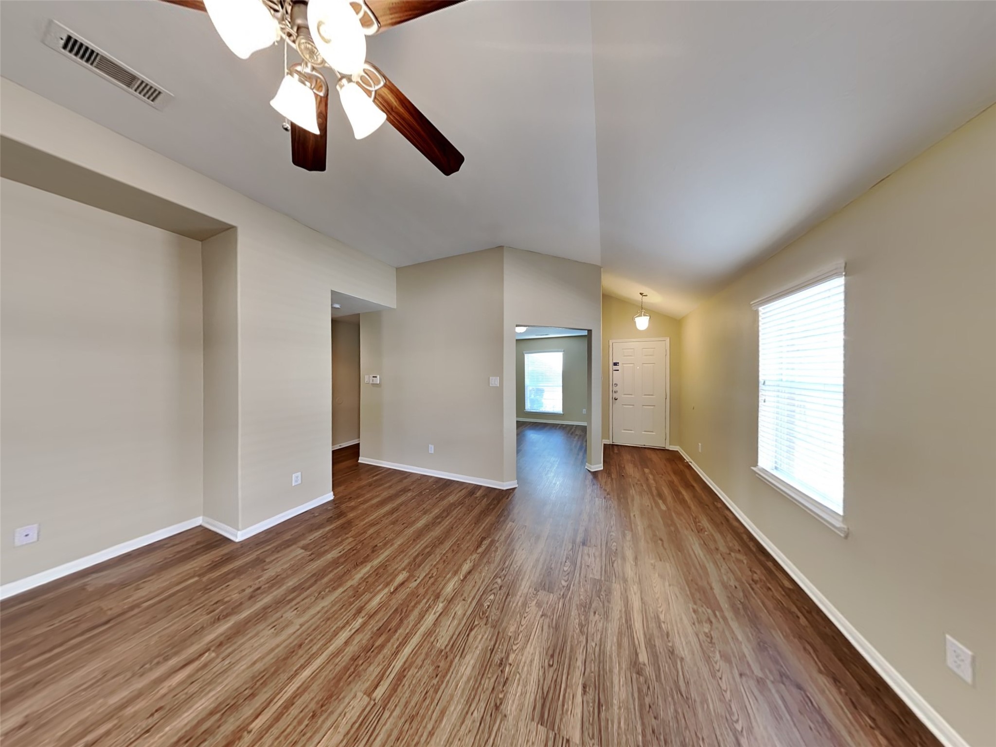 8119 Silent Deep Drive Rosenberg, TX 77469 - Photo 3 of 20 wooden floor in an empty room with a window