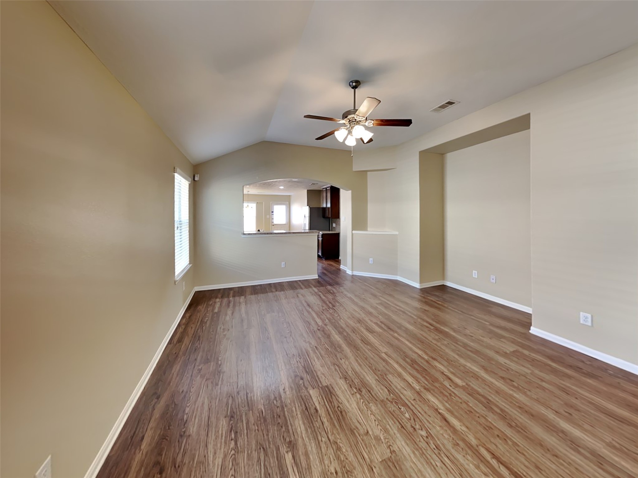 8119 Silent Deep Drive Rosenberg, TX 77469 - Photo 4 of 20 a view of empty room with wooden floor and fan
