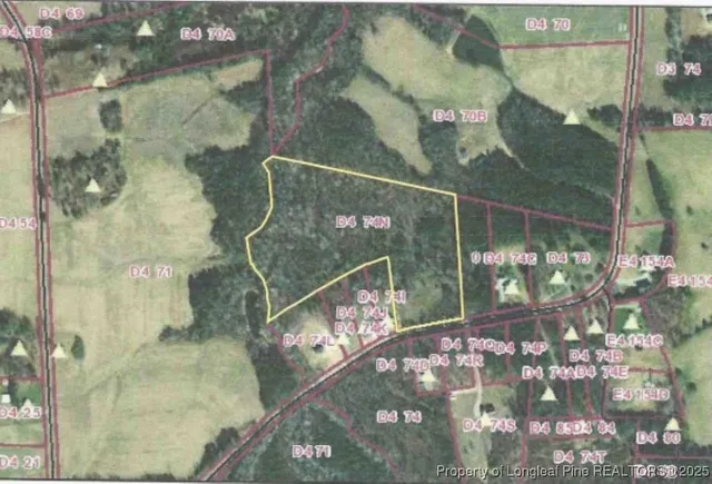 an outdoor space with wooden fence