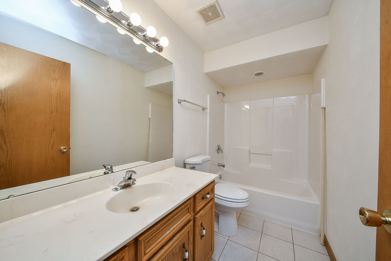 2917 Prairie Road Belvidere, IL 61008 - Photo 17 of 23 a bathroom with a sink a toilet and shower