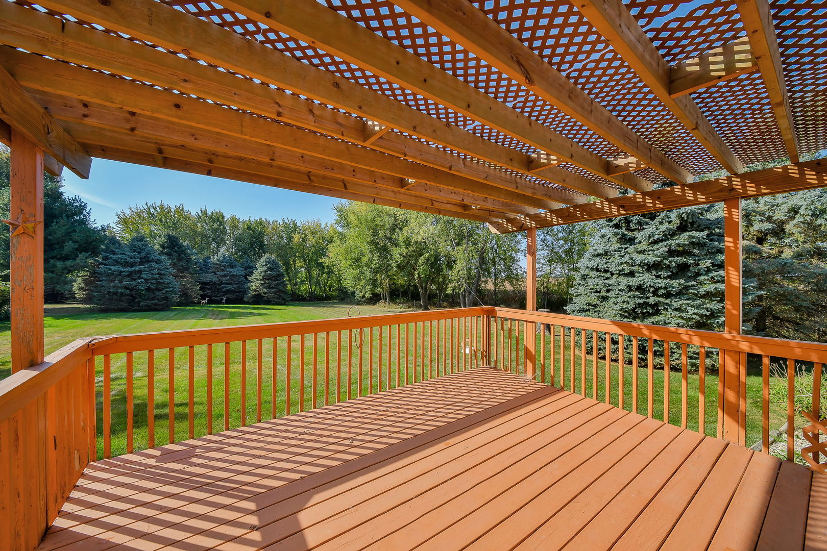 2917 Prairie Road Belvidere, IL 61008 - Photo 19 of 23 a view of a wooden deck with a patio