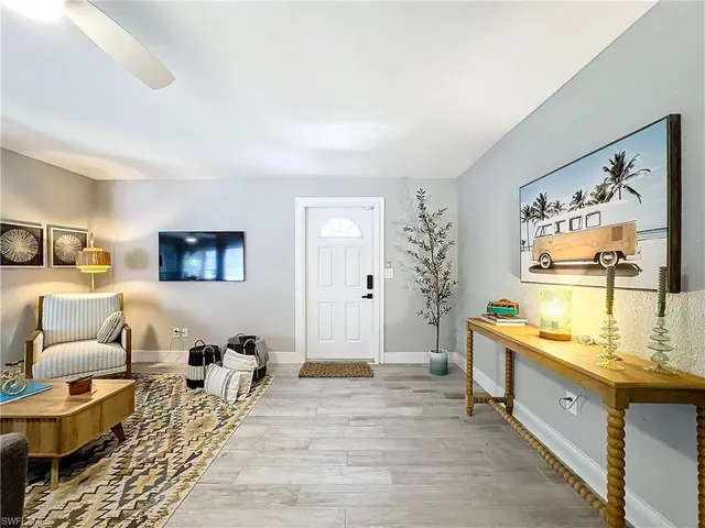 a spacious bedroom with a bed and a couch