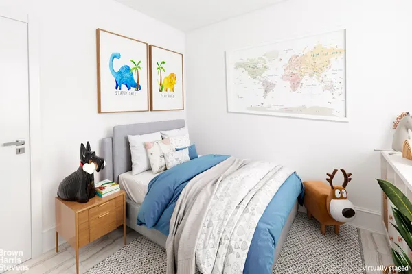 a bed room with furniture and painting on the wall