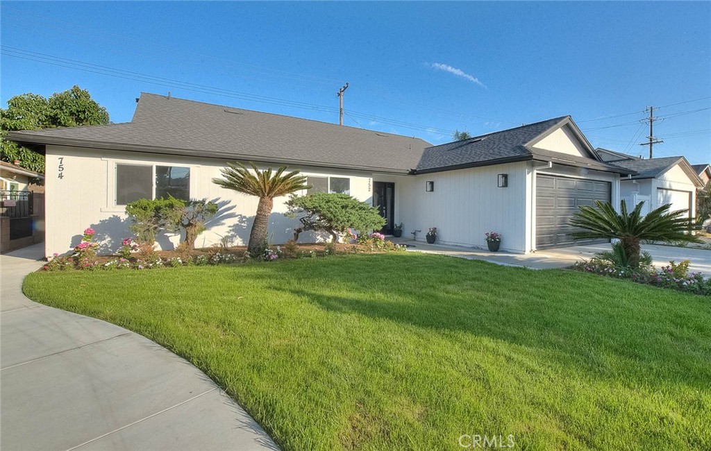 752 Rio Del Sol Avenue Montebello, CA 90640 - Photo 5 of 62 a front view of house with yard