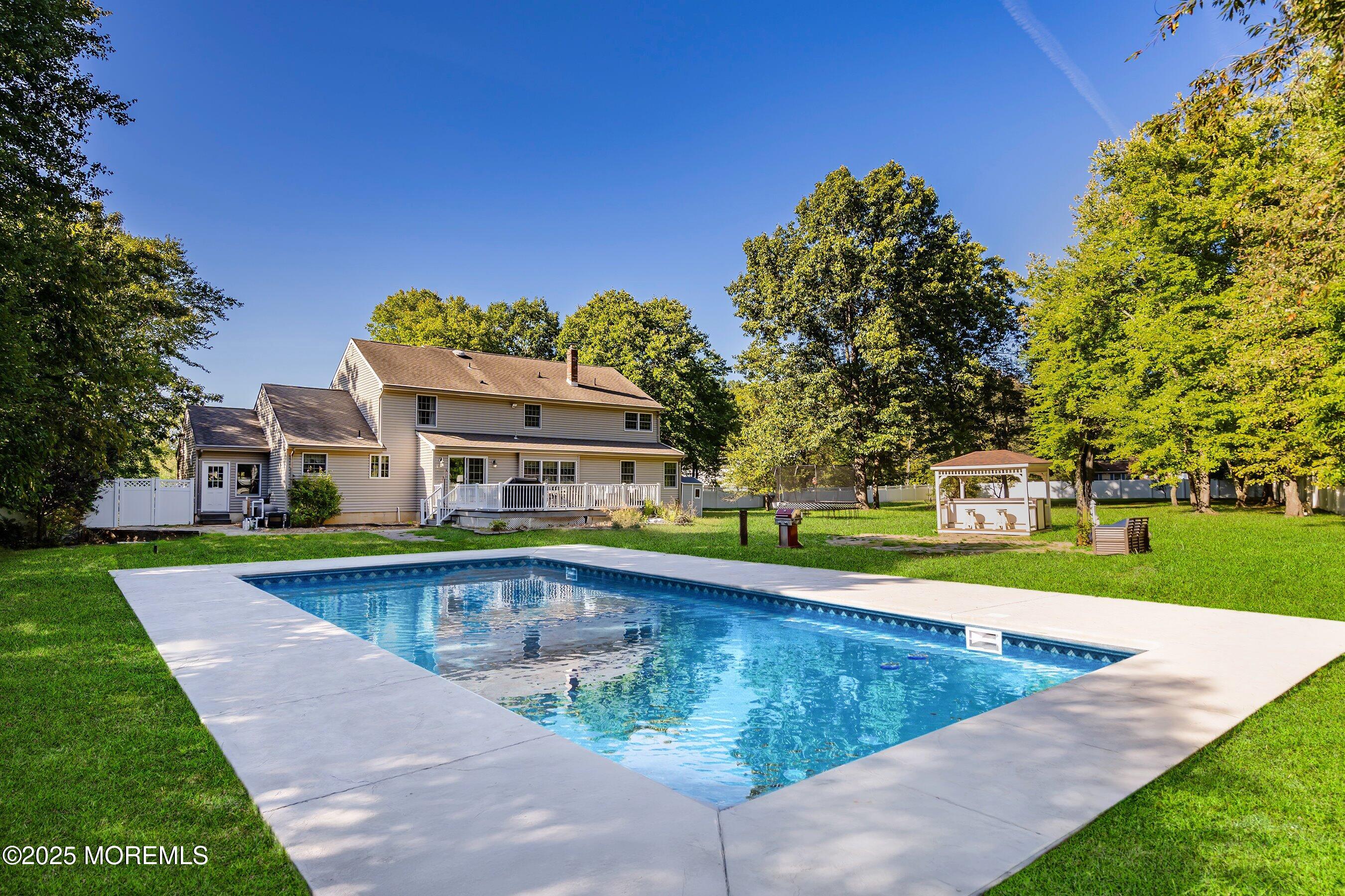657 Rodriguez Lane Jackson, NJ 08527 - Photo 39 of 42 48-Back Left GRASS WATER