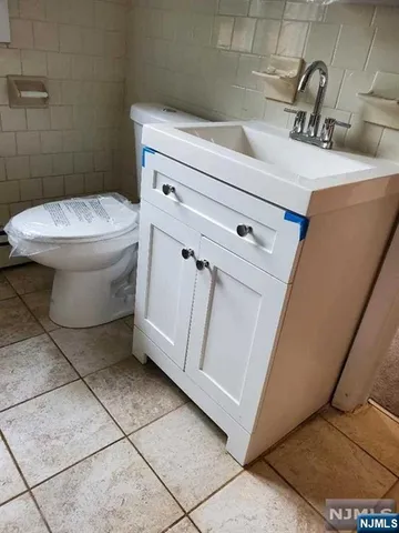 a bathroom with a sink and a toilet