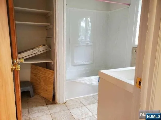 a bathroom with a tub