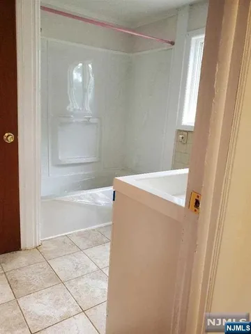 a bathroom with a bathtub