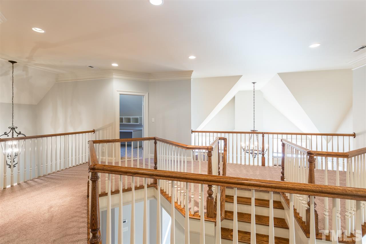 7005 Potomac Court Raleigh, NC 27613 - Photo 22 of 30 a view of an entryway with wooden floor