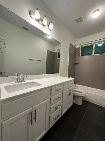 an empty room with a empty space and a window