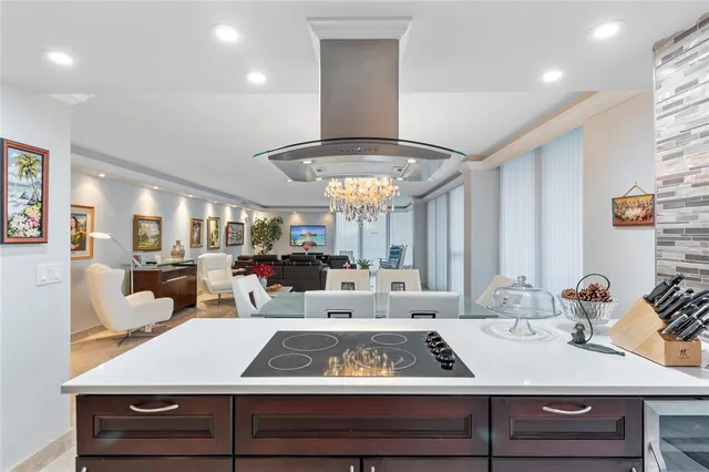 a bedroom with a large bed and a dresser