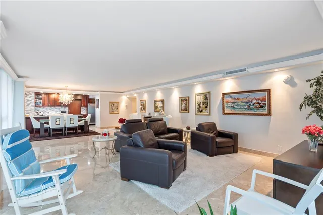 a kitchen with stainless steel appliances granite countertop a stove and a refrigerator