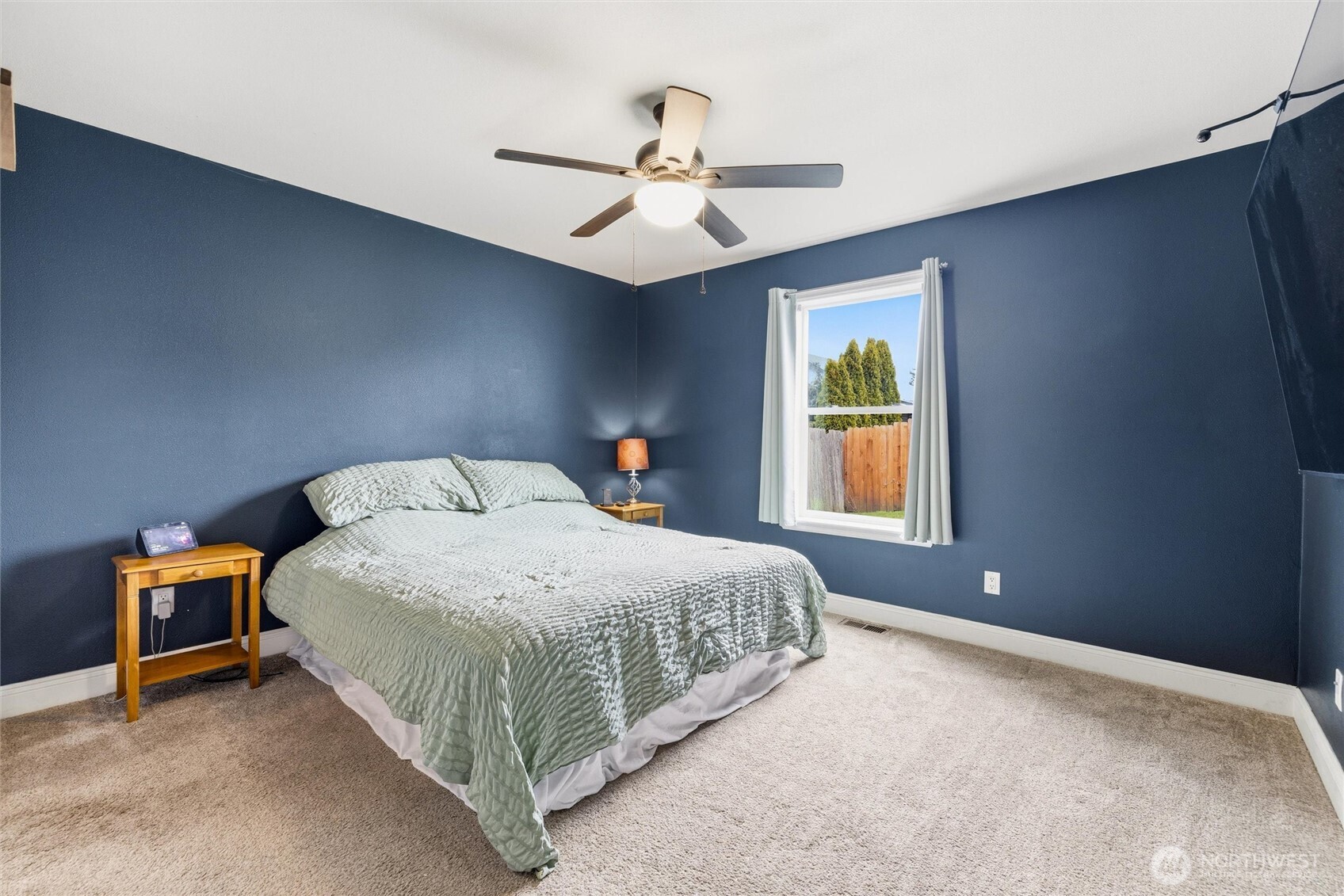 953 3rd Street, Unit 101 Blaine, WA 98230 - Photo 13 of 28 a bedroom with a bed and window