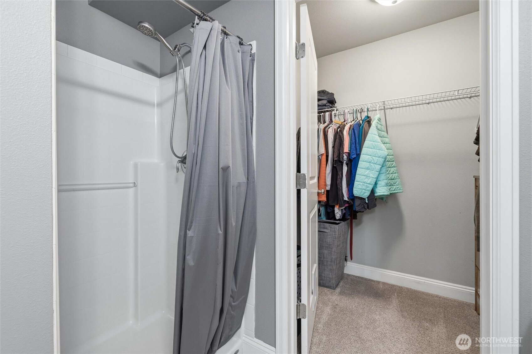 953 3rd Street, Unit 101 Blaine, WA 98230 - Photo 16 of 28 a view of walk in closet with clothes