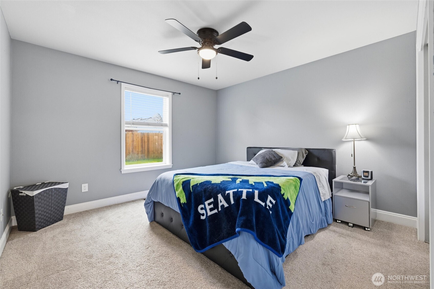 953 3rd Street, Unit 101 Blaine, WA 98230 - Photo 21 of 28 a bedroom with bed and window