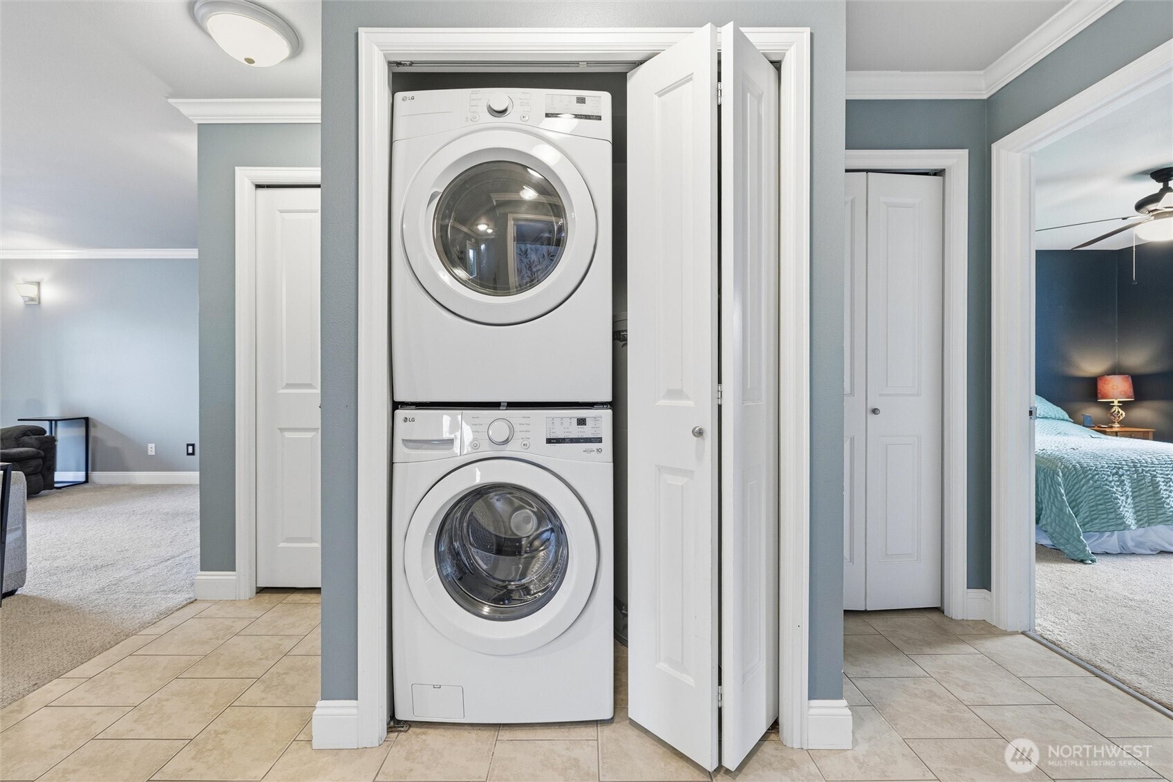 953 3rd Street, Unit 101 Blaine, WA 98230 - Photo 22 of 28 a view of a hallway with washer and dryer