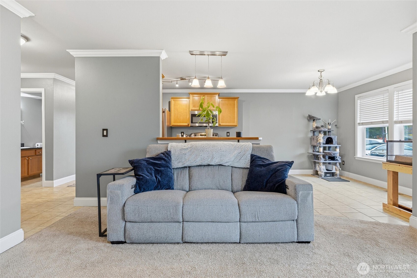 953 3rd Street, Unit 101 Blaine, WA 98230 - Photo 9 of 28 a living room with furniture and a flat screen tv