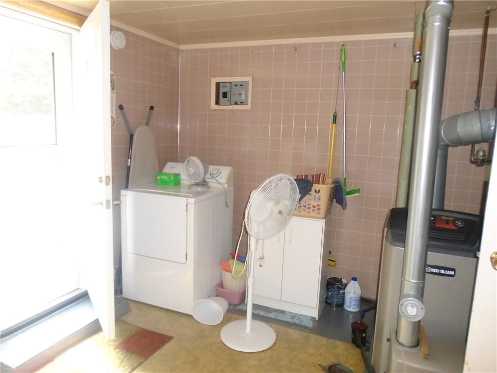 107 Mary Reed Road Baden, PA 15005 - Photo 13 of 23 a bathroom with a sink and toilet