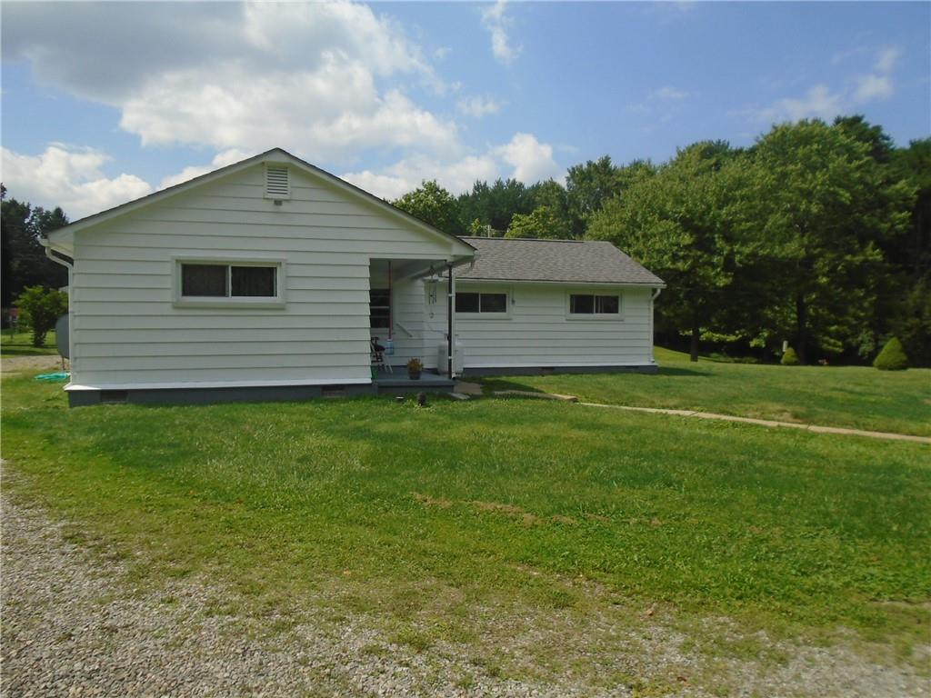 107 Mary Reed Road Baden, PA 15005 - Photo 23 of 23 a front view of house with yard and green space