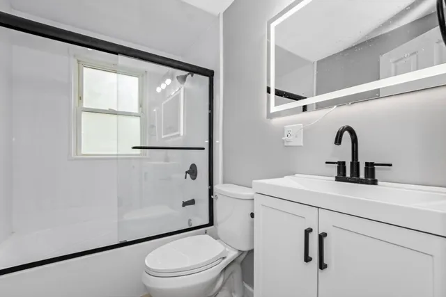 a view of a tree in a yard