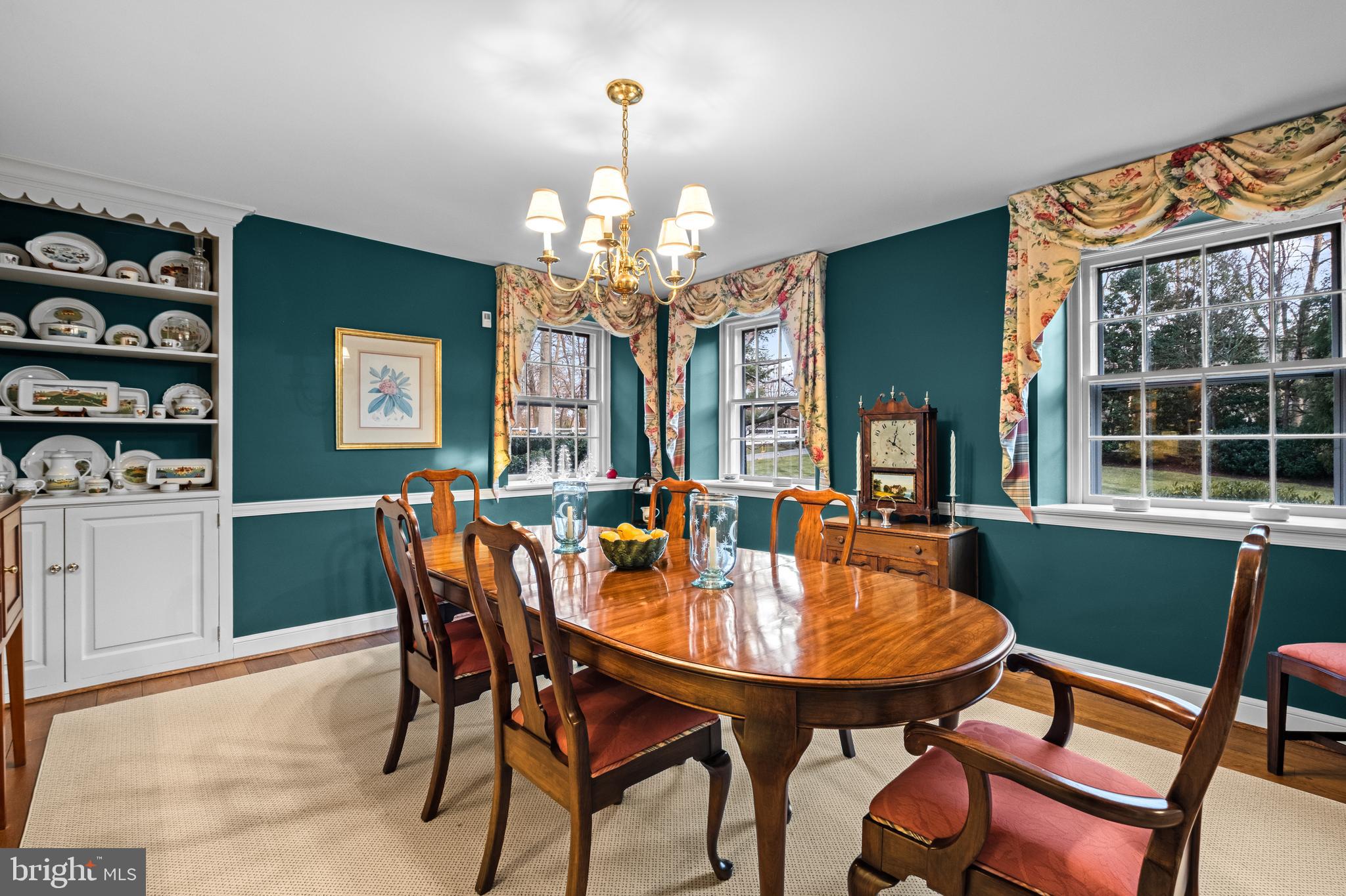 810 Merion Square Road Gladwyne, PA 19035 - Photo 13 of 32 a dining room with furniture a chandelier and window