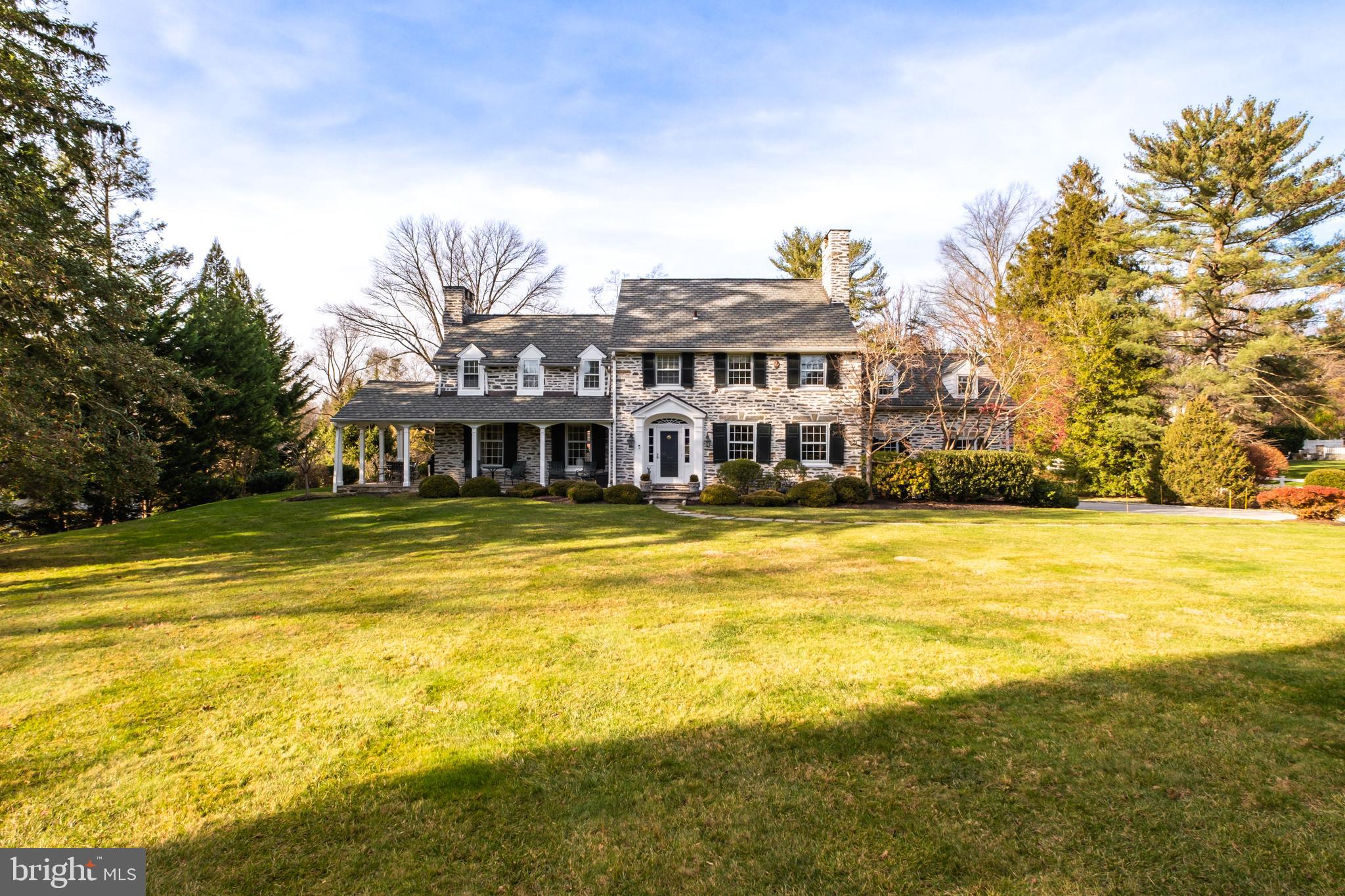 810 Merion Square Road Gladwyne, PA 19035 - Photo 2 of 32 a front view of a house with swimming pool