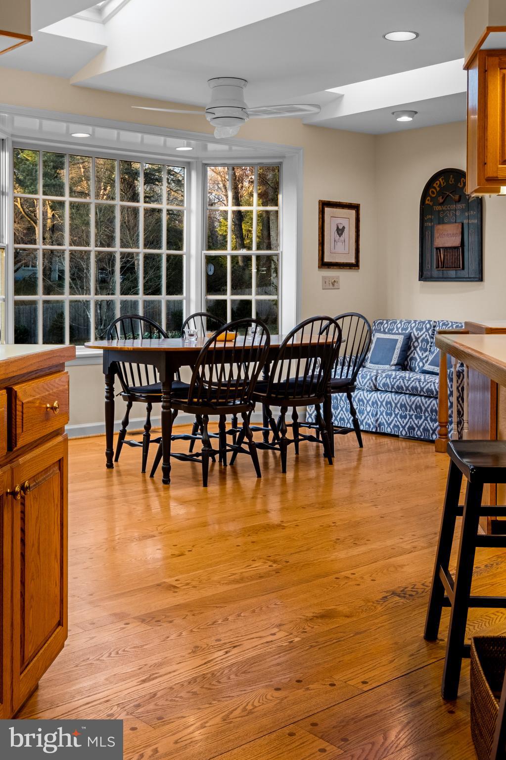 810 Merion Square Road Gladwyne, PA 19035 - Photo 9 of 32 a dining room with furniture and floor to ceiling window