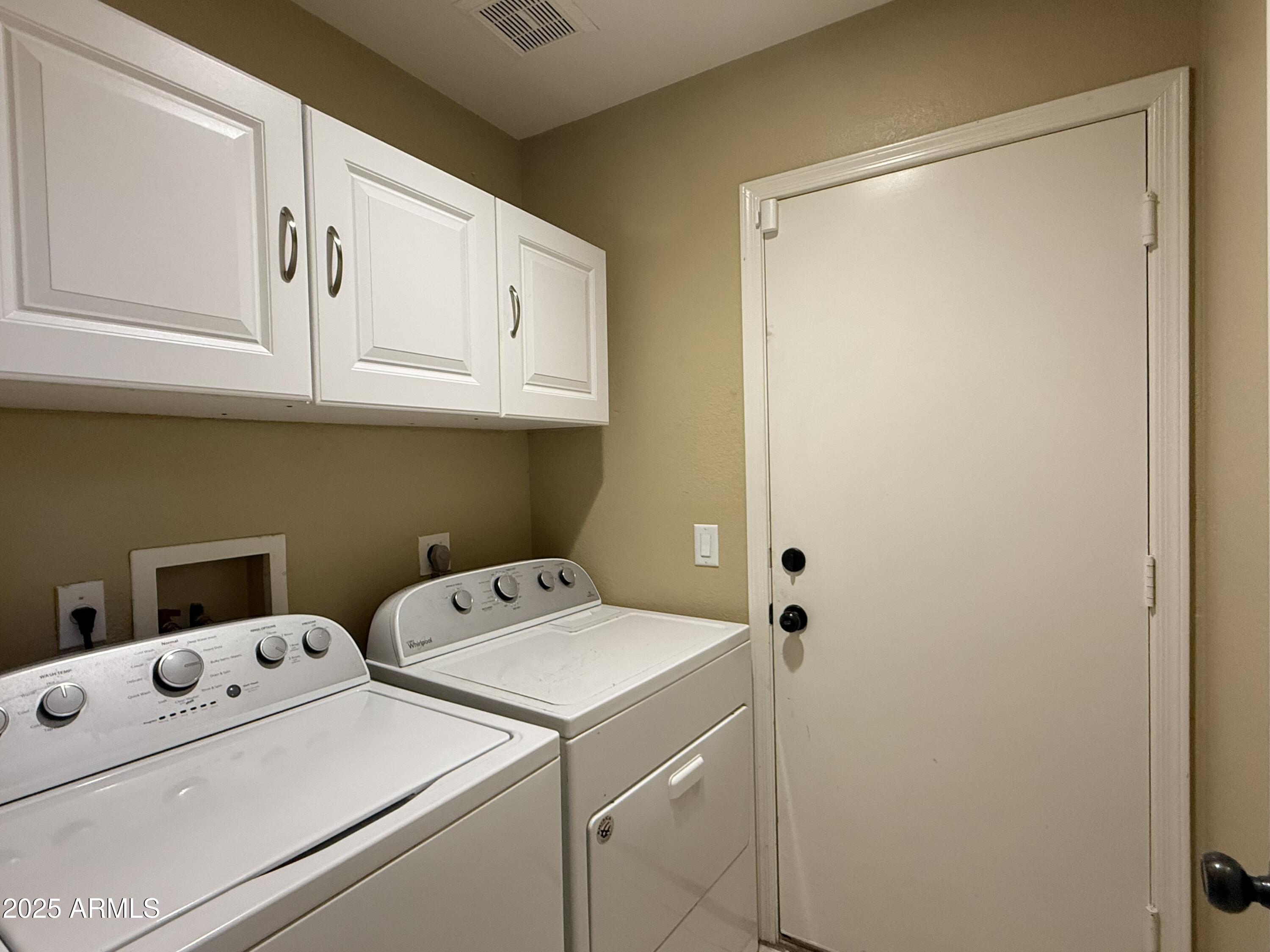 2917 East Windsong Drive Phoenix, AZ 85048 - Photo 23 of 26 a utility room with dryer and washer