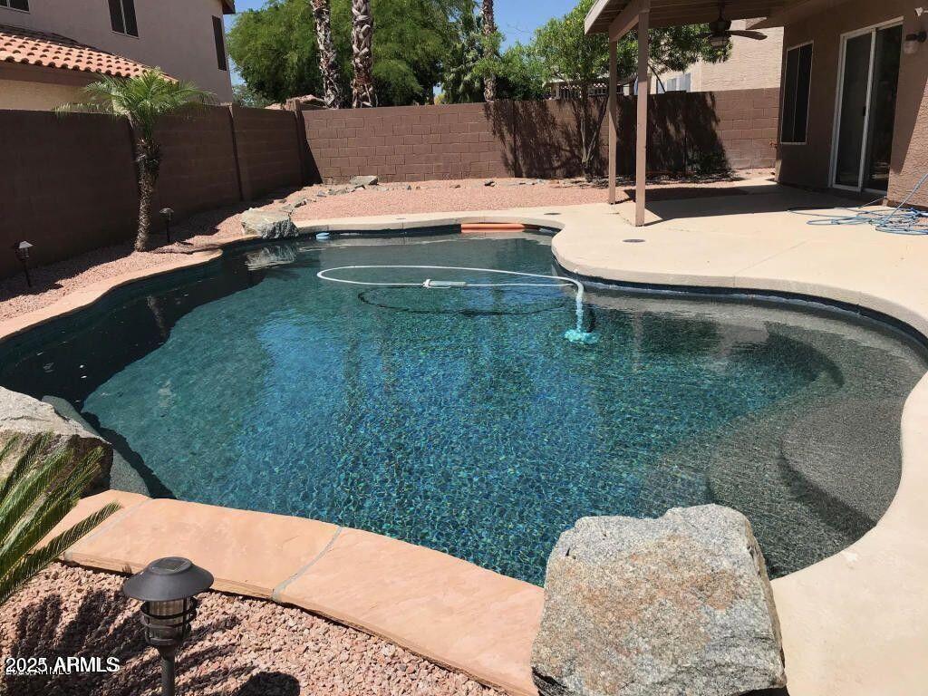 2917 East Windsong Drive Phoenix, AZ 85048 - Photo 25 of 26 a terrace of a house with outdoor seating