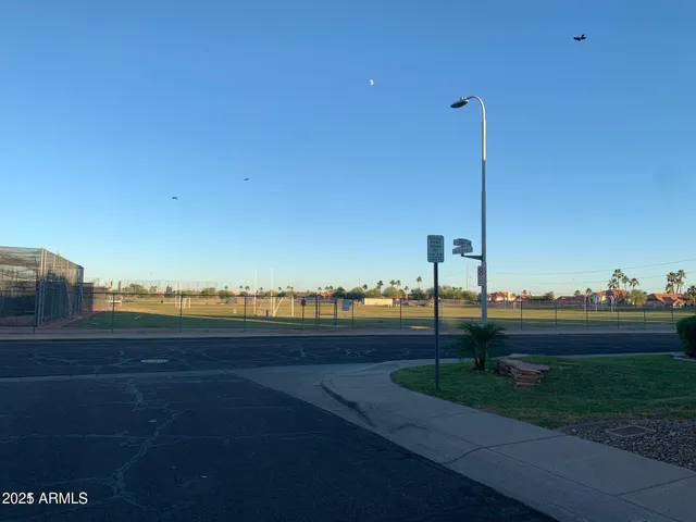 a view of a pathway with a lake view