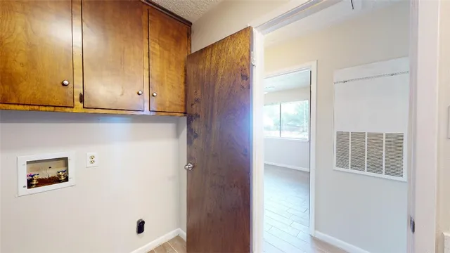 a view of a livingroom with a ceiling fan and window