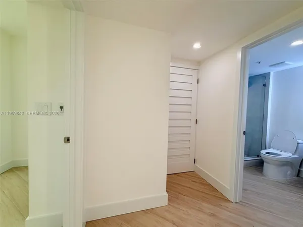 a view of bathroom with a toilet