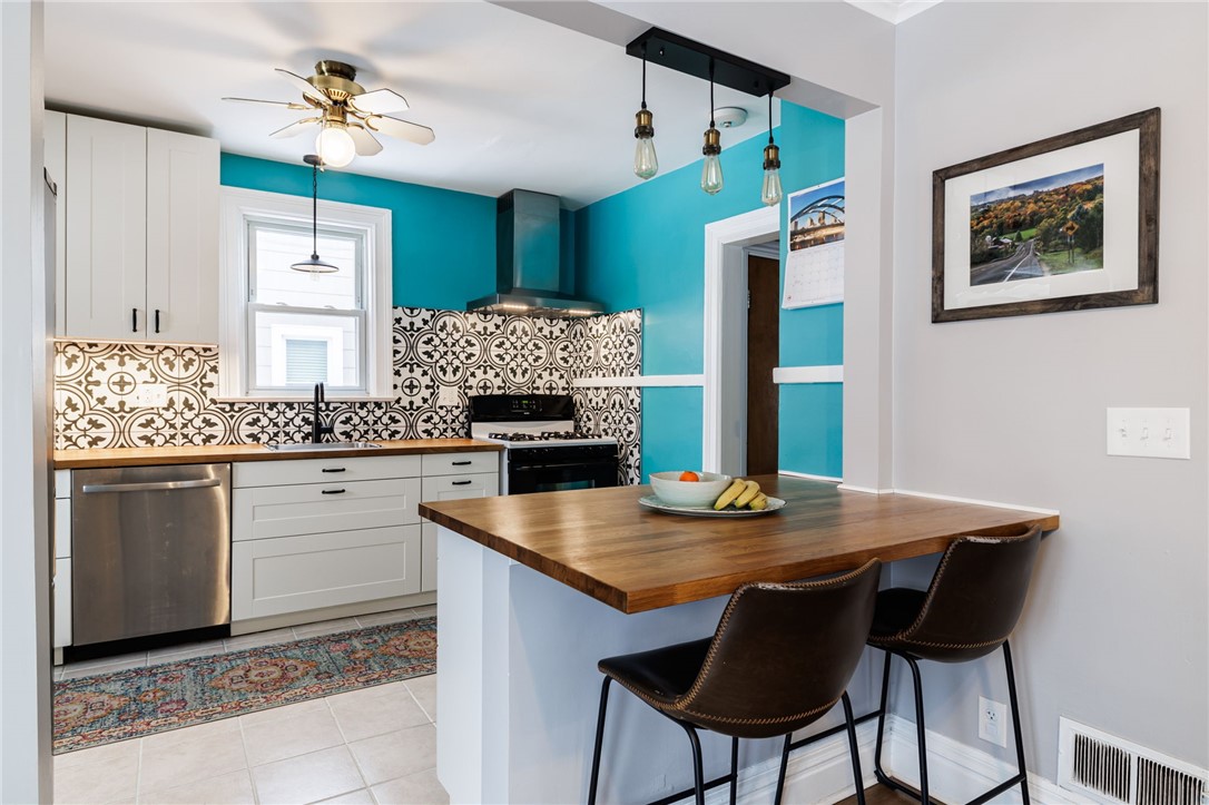 970 Atlantic Avenue Rochester, NY 14609 - Photo 13 of 25 Updated kitchen that is open to the dining room