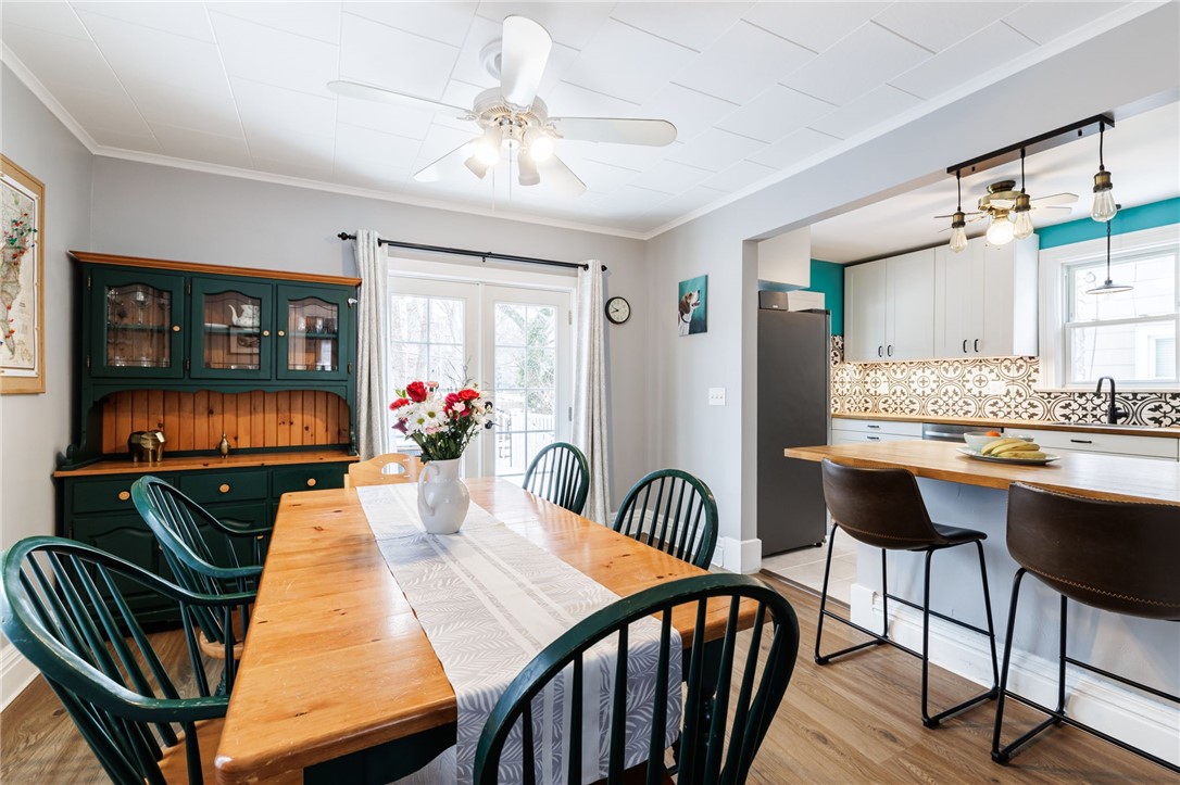 970 Atlantic Avenue Rochester, NY 14609 - Photo 17 of 25 Dining room opens to kitchen with additional seati