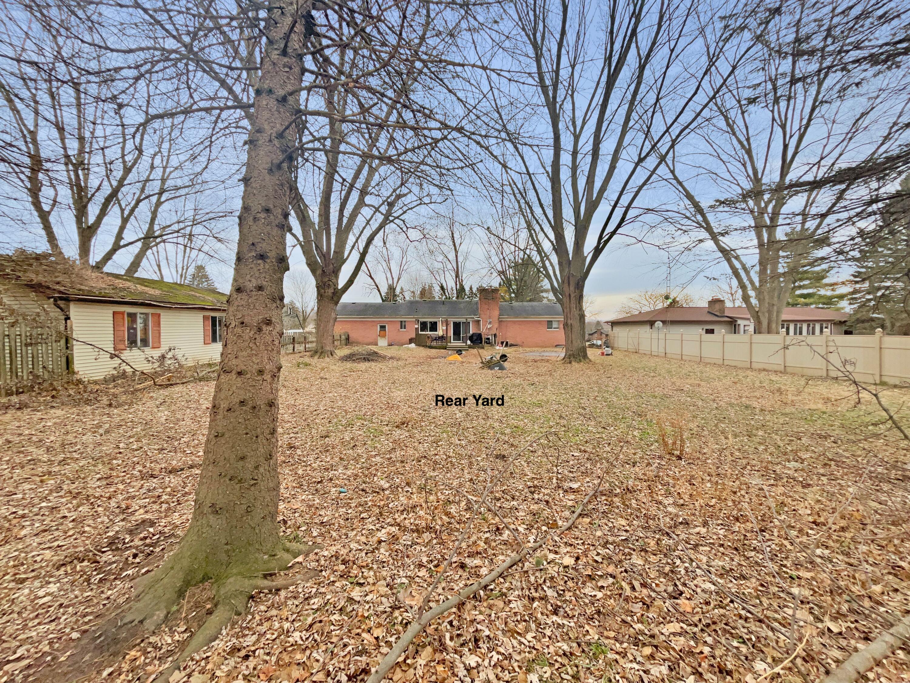 1095 Devenish Lane Flint, MI 48532 - Photo 5 of 31 3 exterior rear view to home