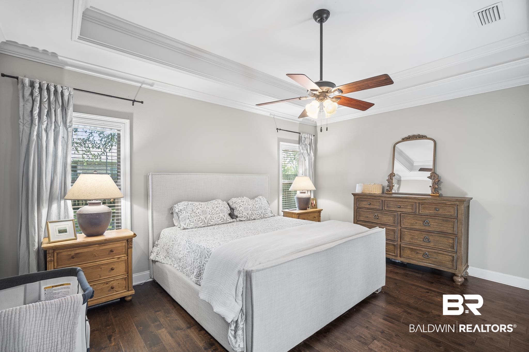 8594 Rosedown Lane Daphne, AL 36526 - Photo 17 of 30 Bedroom featuring crown molding, wood flooring, and a ceiling fan
